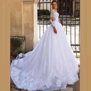 Gorgeous White Tulle Wedding Dresses Long Sleeve Lace Appliques Sheer Neck Court Train Garden Bridal Gowns Sexy Open Back Arabic Dubai Dress