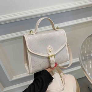 winter new small square letter hand foreign style lock splicing messenger women's bag