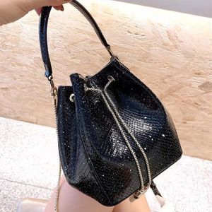 Mini bolsa de balde serpentina feminina 2022 bolsas de designer brilhantes bolsas de mão moda minúscula prata crossbody bolsa de corrente de ombro pedra clássica bolsa feminina de alta qualidade