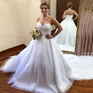 فساتين الكرة البراقة الترتر Tulle Bow Ribbon مخصص Cathedral Train بالإضافة إلى حجم الزفاف فستان Vestido de Novia