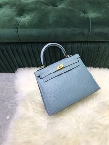25cm real ostrich leather handbag, fully handmade quality,wax stitching ,brand design, light blue 3colors ,wholesale price,fast deliver
