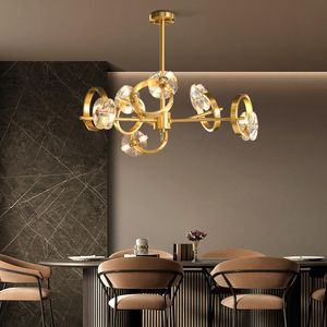 Tutto il lampadario di cristallo del soggiorno nordico in rame lampadario di lusso moderno e minimalista che illumina le lampade a sospensione creative della sala da pranzo