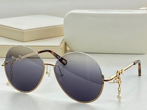 Solglasögon för kvinnor män sommar 0067 tyle anti-ultraviolet retro platta halv ramglasögon slumpmässig låda