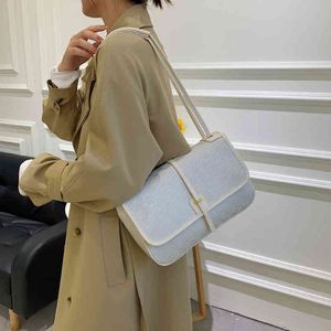 Årets populära kvinnors småpåse ny mångsidig en axel bärbar messenger handväska