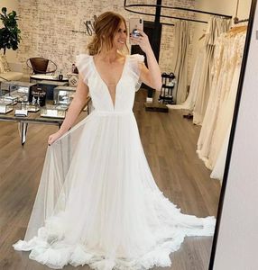 Setwell Deep V-neck A-line Wedding Dresses Sleeveless Pleated Ruffled Tulle Floor Length Summer Beach Bridal Gowns