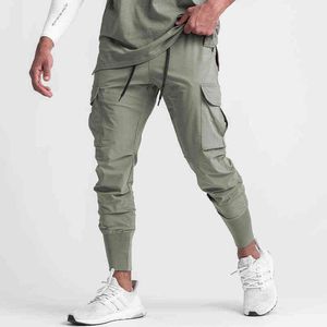 Spodnie joggingowe Mężczyźni Dorywczo Outdoor Cargo Pant Work Wojskowy Tactical Dress Spodnie Ubrania 2021 Casual Mens Spodnie M-3XL G0104