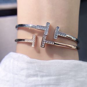 Versión coreana Doble T Carta Apertura Micro Diamante Pulsera Diseño único Pulseras Accesorios de joyería XB068