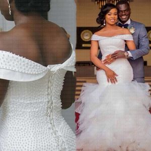 Eleganta afrikanska sjöjungfrun pärlor bröllopsklänningar tillbaka spets upp plus storlek brudklänningar av axel 2021 ny bröllopsklänning vestidos de novia