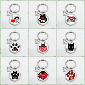 Mycket söt Pet Cat Keychain Cats Vackra män Kvinnor PAW FODPRINT Mönster Keyring God vän Pendant Keychains Favoritkatt Essential