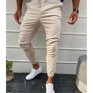 Mens Solid Colors Skinny Pants Fashion Occident Trend Hip Hop Drawstring Jogging Pants Spring Male New Fitness Casual Sports Slim Trousers