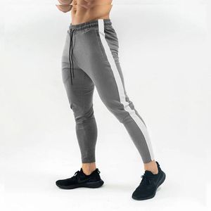 SS Höst Nya Män Fitness Sweatpants Man Gym Bodybuilding Workout Bomull Byxor Casual Joggers Sportkläder Penna Byxor