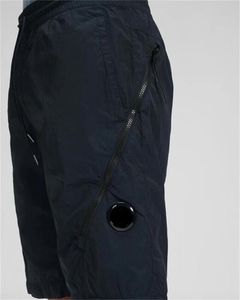 One lens zipper pocket pants men shorts casual nylon dyed goggle removable men track short pant