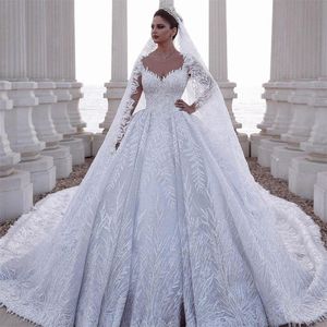2020 Lyxig Beaded Arabic A Line Bröllopsklänningar Kristaller Lace Appliques Tulle monterade brudklänningar plus storlek