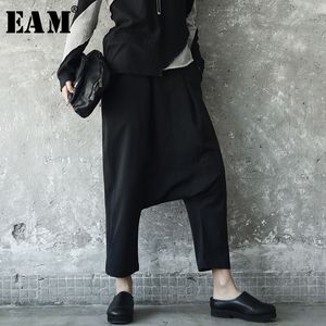[Eam] nova primavera cor sólida alta cintura elástica preto losoe knitting split conjunta calça cruz calças mulheres calças moda maré je8 201228