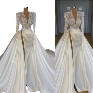 2022 Abiti da sposa a sirena con maniche lunghe di lusso sexy Scollo a V profondo Illusion Perle di cristallo Abiti da sposa in raso arabo con spacco laterale alto Robe de mari￩e Taglie forti