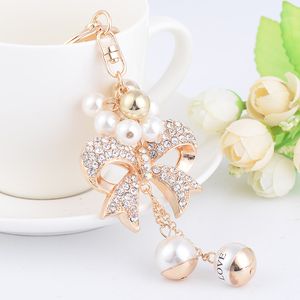 Nowa Moda Ins Luksusowa Designer Diament Rhinestone Cute Bow Pearl Torba Charms Tassel Breloki Białe Złoto
