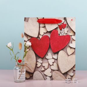 Sacchetto regalo di San Valentino Bianco Kraft Love Heart Sacchetto di carta stampato Matrimonio San Valentino Bomboniere Sacchetto di carta da regalo S M L