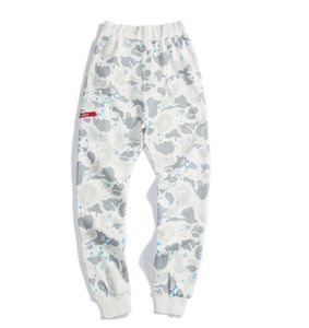 Primavera Atumn Pantaloni casual mimetici stellati da uomo nuovi Pantaloni hip-hop larghi luminosi bianchi neri dell'amante 281T