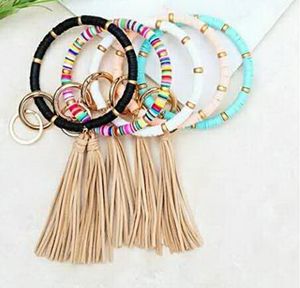 Modig personlighet Mjukt keramiskt armband Keychain Golden Bead Suede Tassel Pendant Key Ring