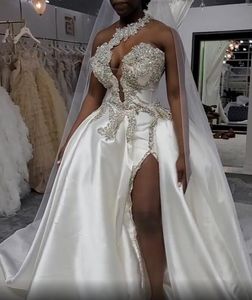2022 Sexy Arabic Luxury A Line Wedding Dresses Bridal Dress One Shoulder Lace Appliques Silver Crystal Beaded Side Split Wedding Gowns Cathedral Train Overskirts