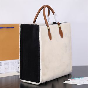 Famous Shopping Umhängetaschen Handtaschen Gestickte Canvas-Buchtasche Handtasche geprägte Tragetaschen Hochwertige Damentasche Schultertasche M