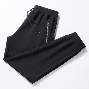 MOGU nuova primavera autunno uomo pantaloni sportivi casual 2020 abbigliamento sportivo da uomo pantaloni da jogging pantaloni moda maschile allentato slim aderente palestre pantaloni harem LJ201104