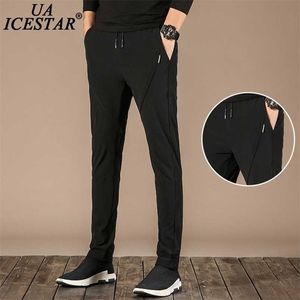 Czarne spodnie sportowe Mężczyźni Letnie Oddychające Szybkie Suche Casual Zipper Kieszonkowy Spodnie dresowe Mężczyźni Marka Moda Luźne męskie Spodnie 211201
