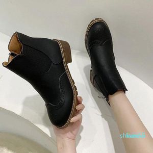 2021 Mulheres Pu Couro Ankle Botas Mulheres Outono Inverno Cross Estrappy Vintage Mulheres Zipper Botas Flat Ladies Shoes Mulher 00661