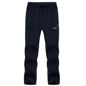 Men jogging Loose Sports Running Pants Sportswear cotton trousers Joggers Training Elastic Waist Casual racksuit Sports Pants 211108