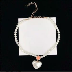 Luxury jewelry Heart shaped middle Rhinestone Pearl Brass Necklace European and American fashion simple sweater chain