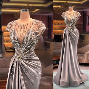 2021 Arabiska sexiga lyxiga balklänningar Juvelhals Illusion Cap Sleeves Crystal Beading Sequin Bling Formal Party Dress Evening Gown288s