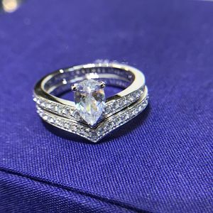 Anello di fidanzamento a taglio rotondo da 5 * 7 CT Anello nuziale con doppio alone di diamanti Moissanite in argento placcato platino