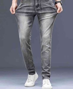 Jeans da uomo autunnali in cotone Pantaloni da lavoro alla moda elastici sottili Jeans stile classico Pantaloni in denim Pantaloni da uomo Colore grigio