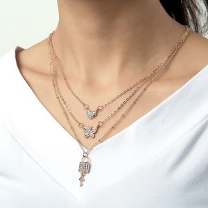 Bohemian MultiLayer Butterfly Halsband Ord Kvinnor Män Mode Key Lock Crystal Pendant Nya Trendiga Smycken