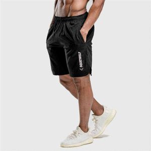 Män shorts avslappnad odefinierade CrossFit -basketbyxor som kör manliga smarta sportkläder Homens Pantalones de Masculina Pants H1210