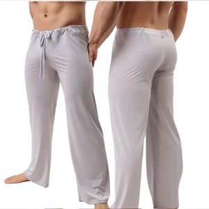 Indumenti da notte da uomo Pantaloni da casa da uomo Vita bassa Vedere attraverso Pigiama scivoloso allentato trasparente Abbigliamento da salotto in seta di ghiaccio maschile Lingerie sexy Abbigliamento gay