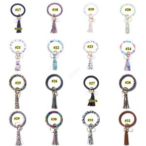 Flera stilar Sun Flower Tie-färgad läderfolie Tassels armband Keychain Wristlet Armband Tassel Keychain Round Bangle Key Ring DHT33