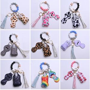 12 Cores Borla De Madeira Silicone Bead String Pulseira Keychain Bag Chaveiro Chaveiro Chaveiro Hand Sanitizer Holder com Bottels para Jóias da Moda Wowent