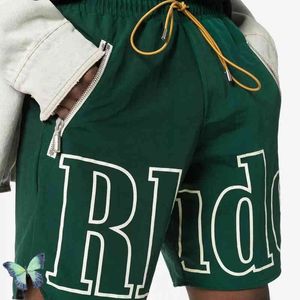 Rhude Shorts 남성 여성 RH 짧은 바지 메쉬 Brechcloth 긴 노란색 Drawstring