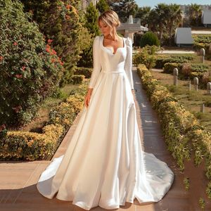 Modern Afryka Gardne Suknie Ślubne Nowy 2022 Długie Rękawy Satin Princess Bride Dress Queen Anna Neck Backless Suknie ślubne