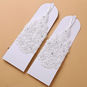 Nya spetsapplikationer pärlor fingerfri handledslängd med band brudhandskar bröllopstillbehör