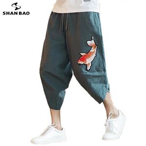 Marca pantalones recortados sueltos estilo japonés y coreano moda de verano bordado de calamar harem de gran tamaño para hombres 210715