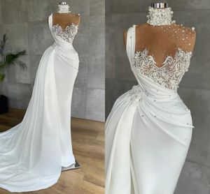 Erstaunliche arabische Aso Ebi Meerjungfrau Abendkleider Luxuriöse Perlen Perlen High Neck Illusion Top Prom Party Kleider Spitze Applikationen Schößchen Geraffte Vestidos De