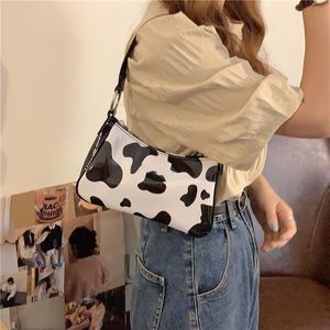 Bolsas de cosméticos casos de harajuku PU bolsa de couro kawaii fofa de vaca doce spot spot spot mini axilar axilar PouchcoSmetic Cosmet