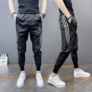 2021 Nowe męskie małe stóp Casual Sports Spodnie Cienkie dziewięć punktowe Modne Czarne Slim Harem Spodnie Odzież Streetwear Jogging X0723