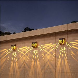 太陽フェンスライトウォールガーデンウォームホワイトプロジェクションランプ防水装飾ライト
