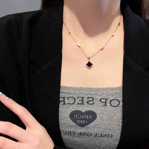 Black and White Double-sided Lucky Grass Pendant Necklace Female Cool Temperament Net Red Clavicle Chain Ins Titanium Steel Necklace