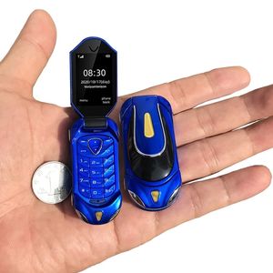 Lyxig minsta bilnyckel form guld tecknad film flip mobiltelefon Bluetoot Ring Nej Internet Mini Pocket Portable student mobiltelefon gåva för barn