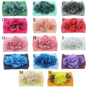 Nuove fasce per capelli in nylon con fiore che brucia Ragazze morbide e larghe fasce per turbante in nylon per bambine Copricapo avvolgente per la testa