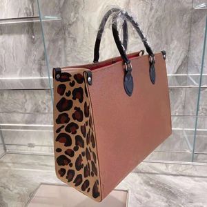 Designer women's shoulder bag portable leopard print embossing process size 41cm